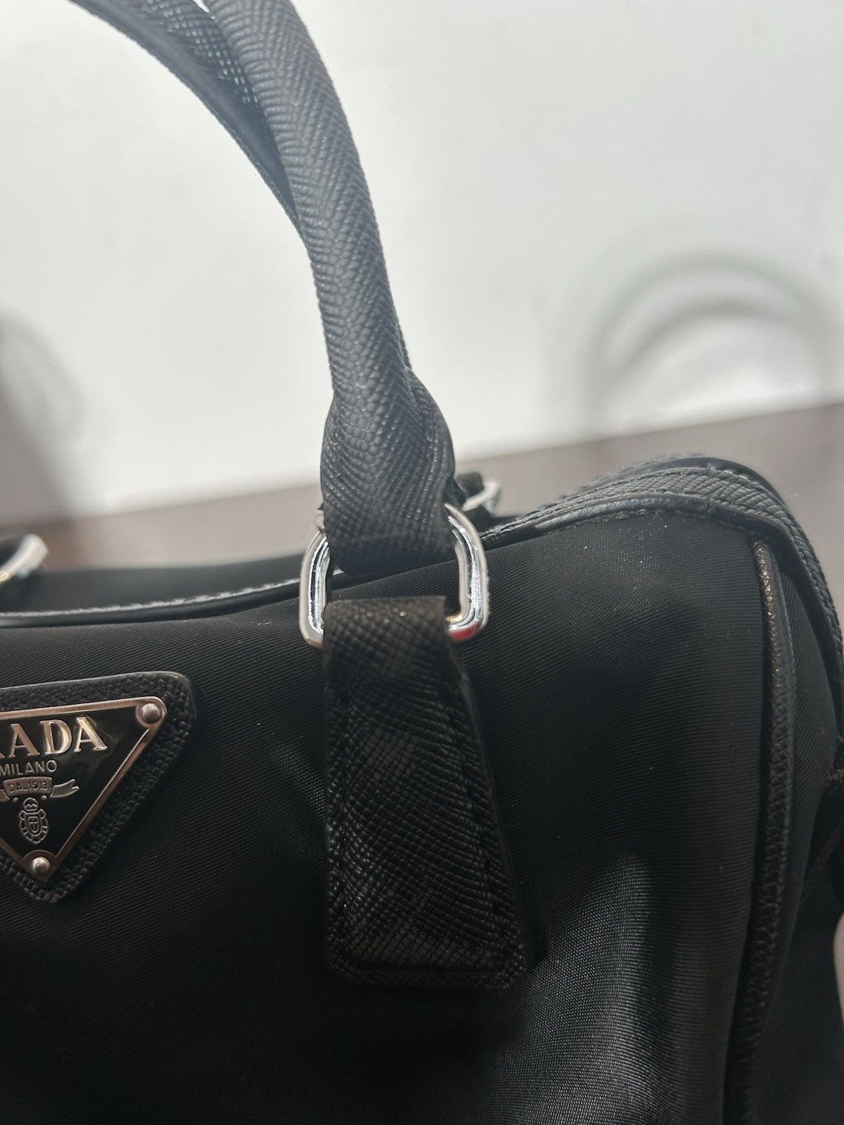 Prada Re-Edition Nylon Top Handle Bag In Black