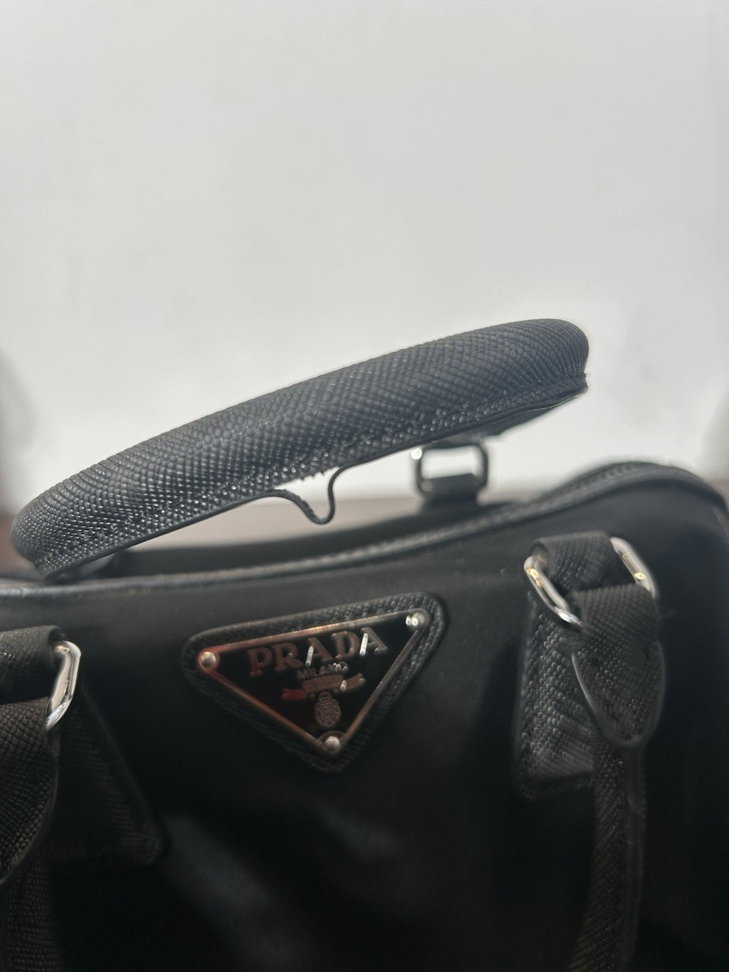 Prada Re-Edition Nylon Top Handle Bag In Black
