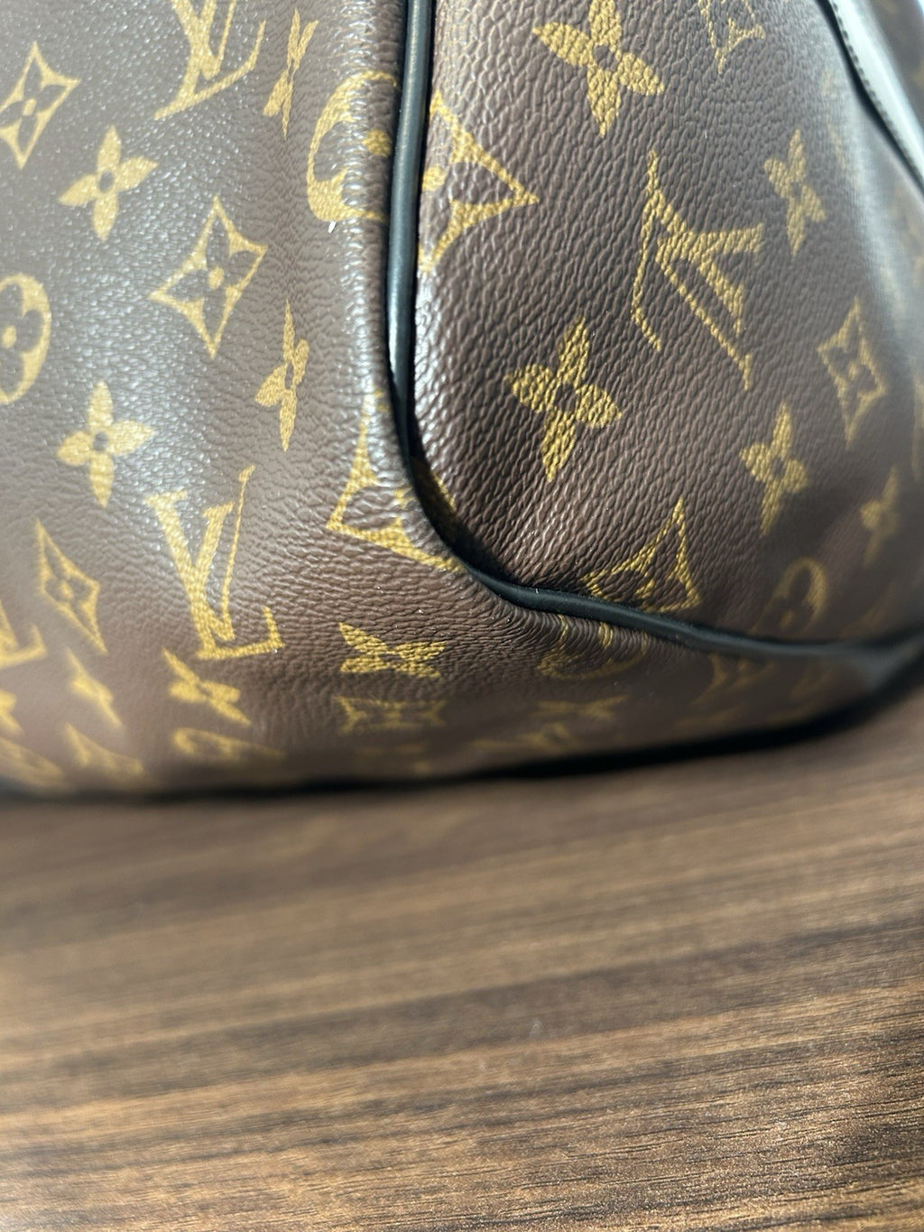 Louis Vuitton Monogram Macassar Keepall Bandoulière travel bag