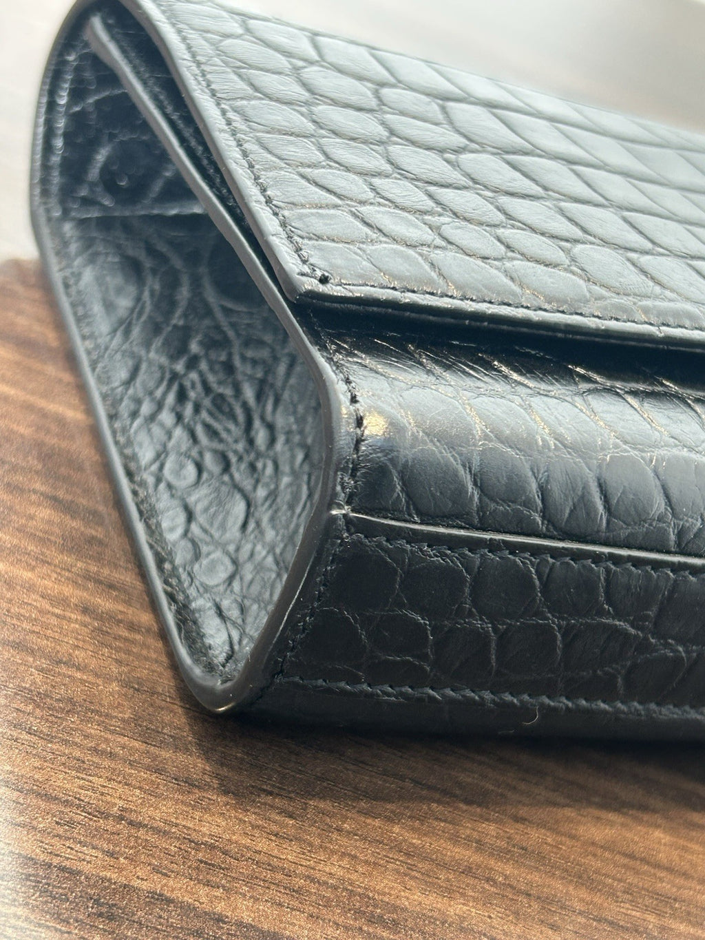 YSL Saint Laurent Calfskin Crocodile Embossed Monogram Tassel Clutch Kate Black