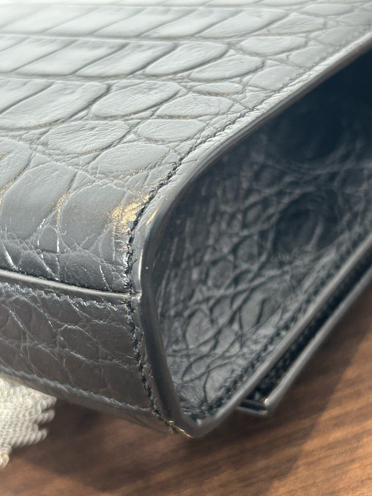 YSL Saint Laurent Calfskin Crocodile Embossed Monogram Tassel Clutch Kate Black