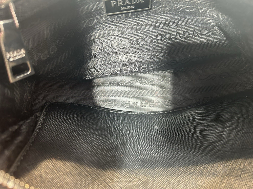 Prada Re-Edition Nylon Top Handle Bag In Black