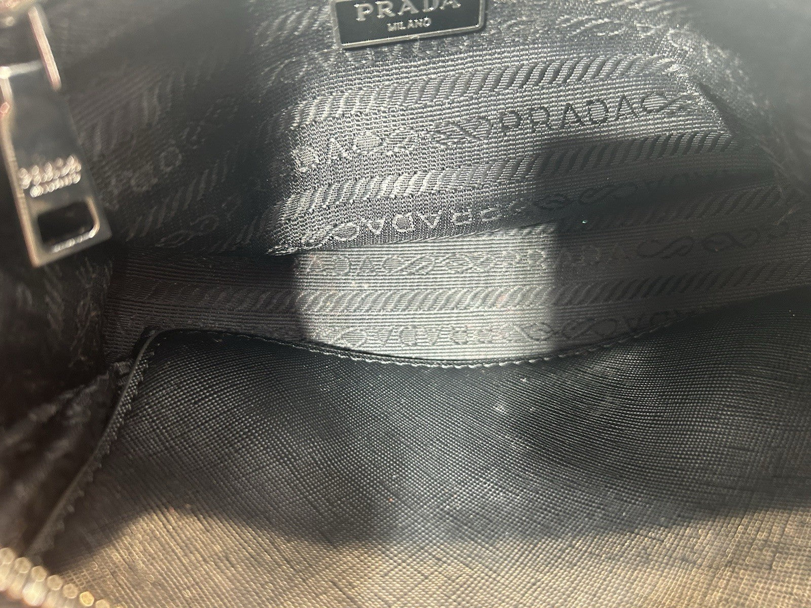 Prada Re-Edition Nylon Top Handle Bag In Black