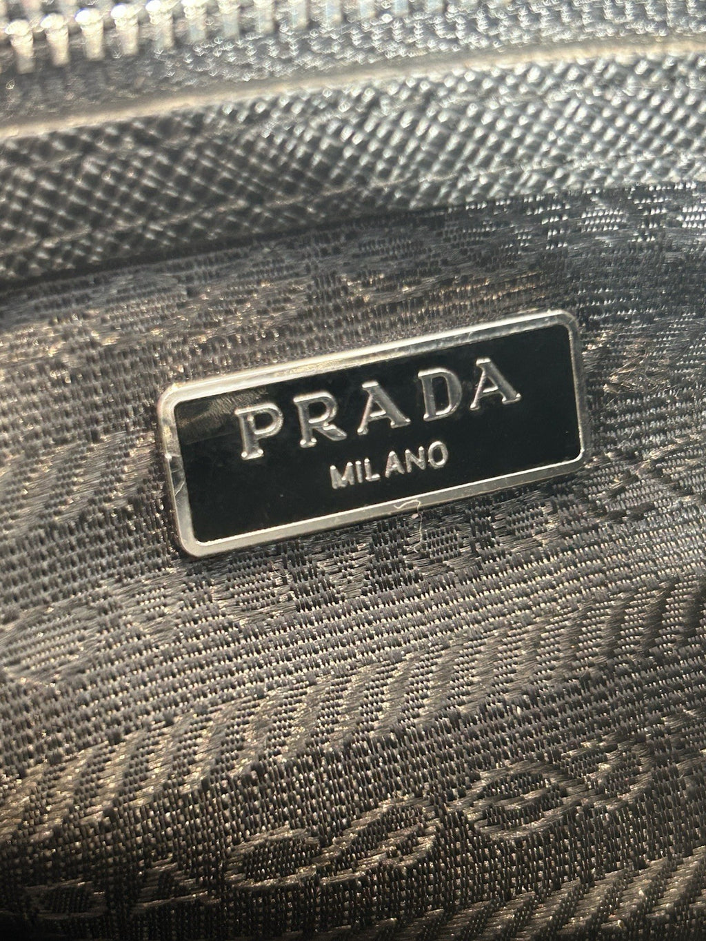 Prada Re-Edition Nylon Top Handle Bag In Black
