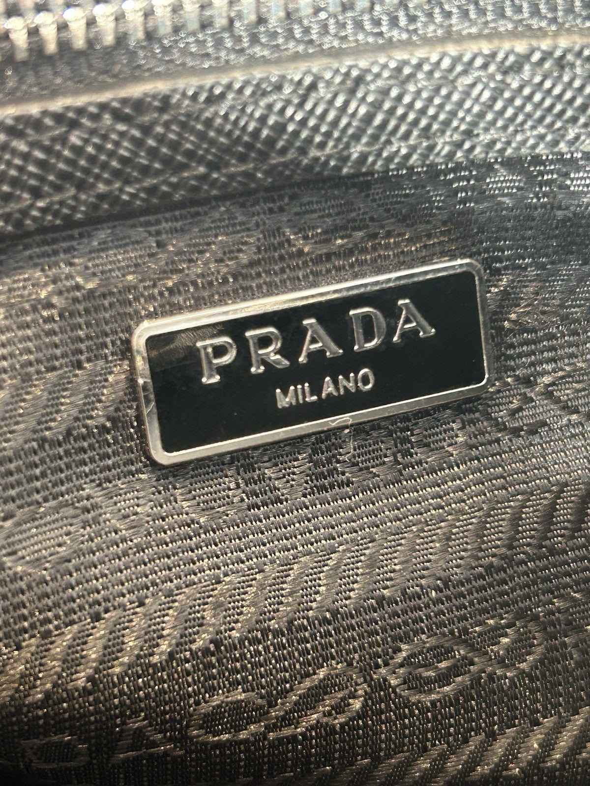 Prada Re-Edition Nylon Top Handle Bag In Black