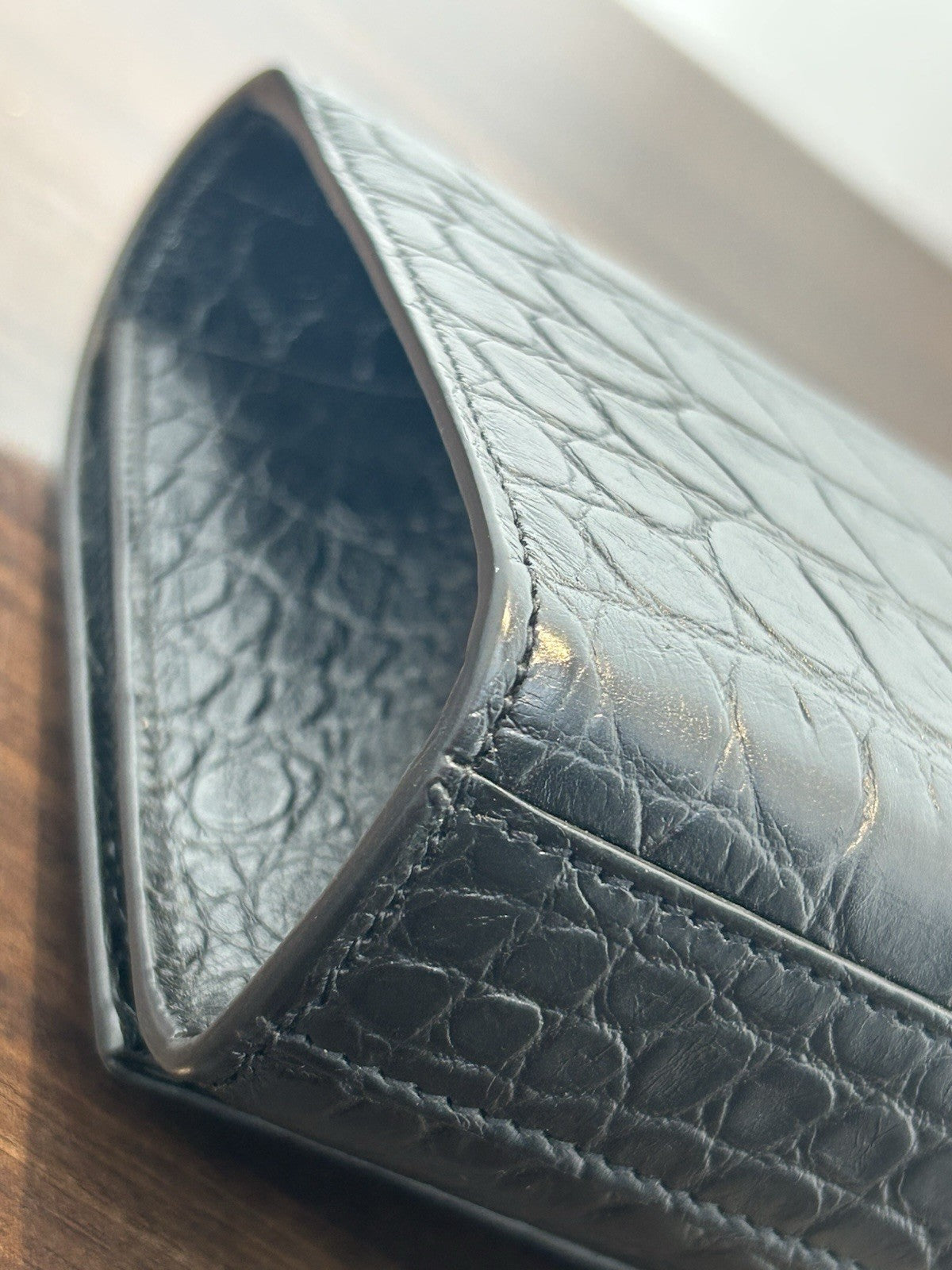 YSL Saint Laurent Calfskin Crocodile Embossed Monogram Tassel Clutch Kate Black