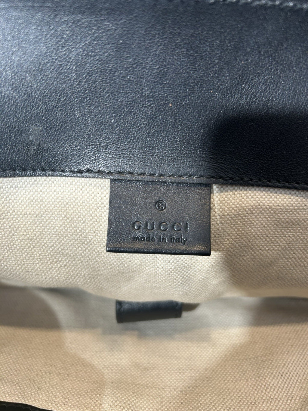 Gucci Double Buckle Backpack GG Embossed Perforated Leather Large